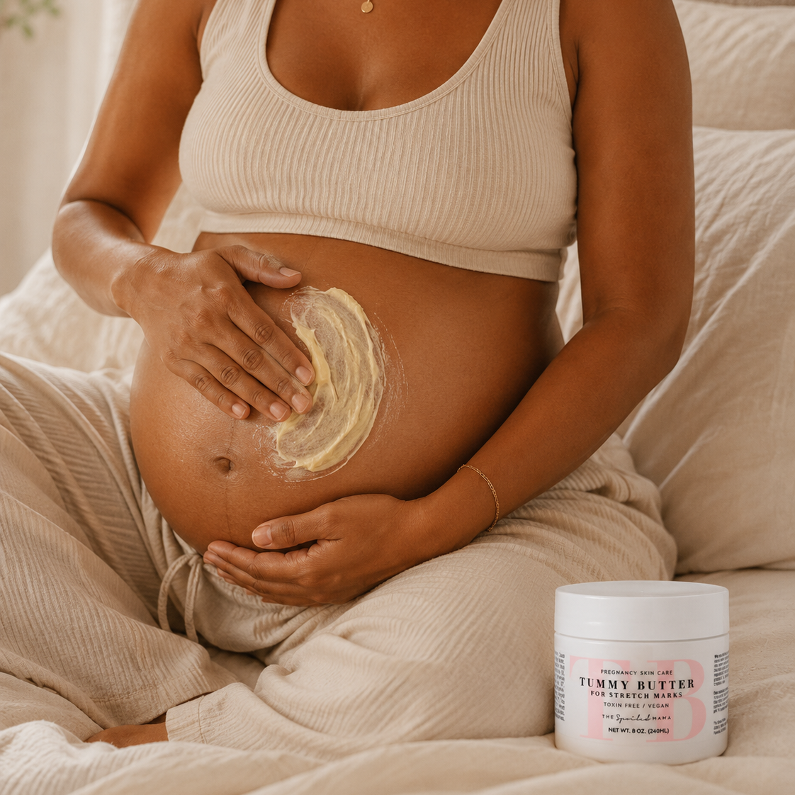 Pregnant Mama applying Tummy Butter for pregnancy stretch marks
